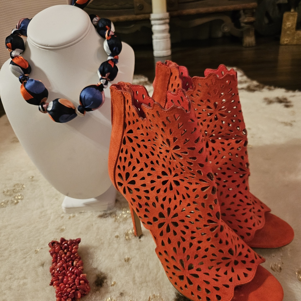ALDO Orange Laser-Cut Heeled Boots